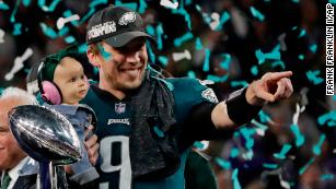 Philadelphia Eagles quarterback Nick Foles (9) holds up the Vince Lombardi  Trophy after Super Bowl LII at U.S. Bank Stadium in Minneapolis, Minnesota  on February 4, 2018. The Philadelphia Eagles won 41-33