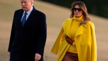 US President Donald Trump and First Lady Melania Trump walk across the South Lawn upon arrival on Marine One at the White House in Washington, DC, February 5, 2018, following a tripl to Ohio.