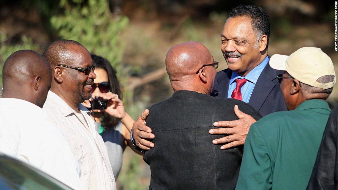 Zuma greets American civil-rights activist Jesse Jackson at a ceremony in Bloemfontein, South Africa, in January 2012.