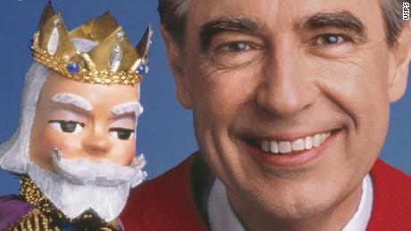 Mister Rogers poses with King Friday, a cantankerous puppet he voiced on "Mister Rogers' Neighborhood." 