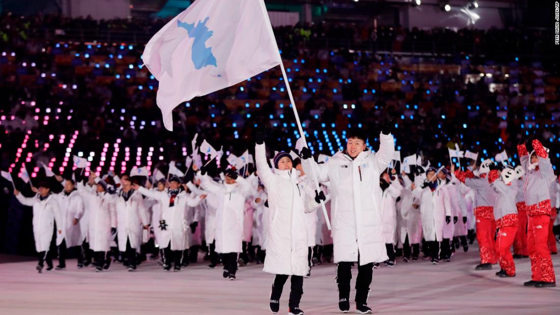 North and South Korean athletes march together during the parade of nations. It has happened only three other times in Olympic history.