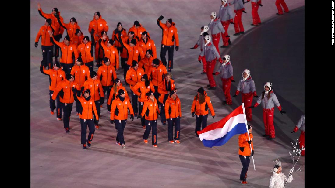 Dutch athletes enter the stadium.