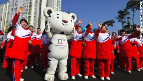 North Korean athletes take part in a welcoming ceremony for the team at the Olympic Village in Gangneung on February 8.