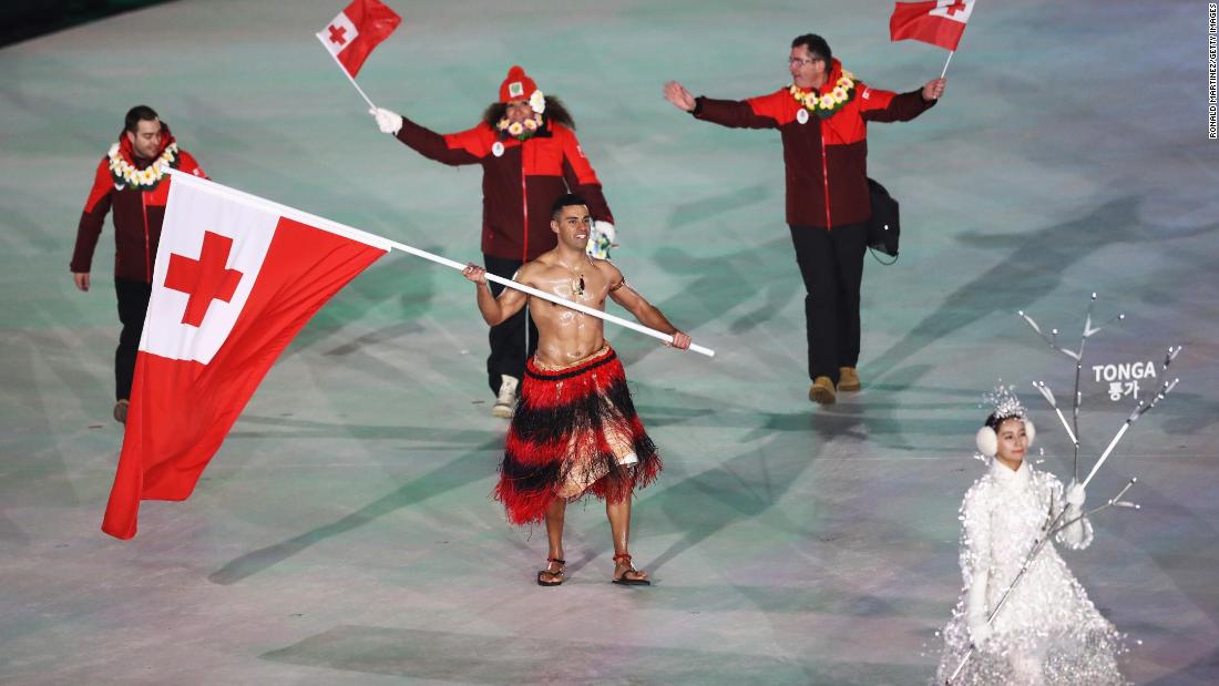 Tongan flag bearer Pita Taufatofua goes shirtless, as he did for the opening ceremony of the 2016 Summer Olympics.