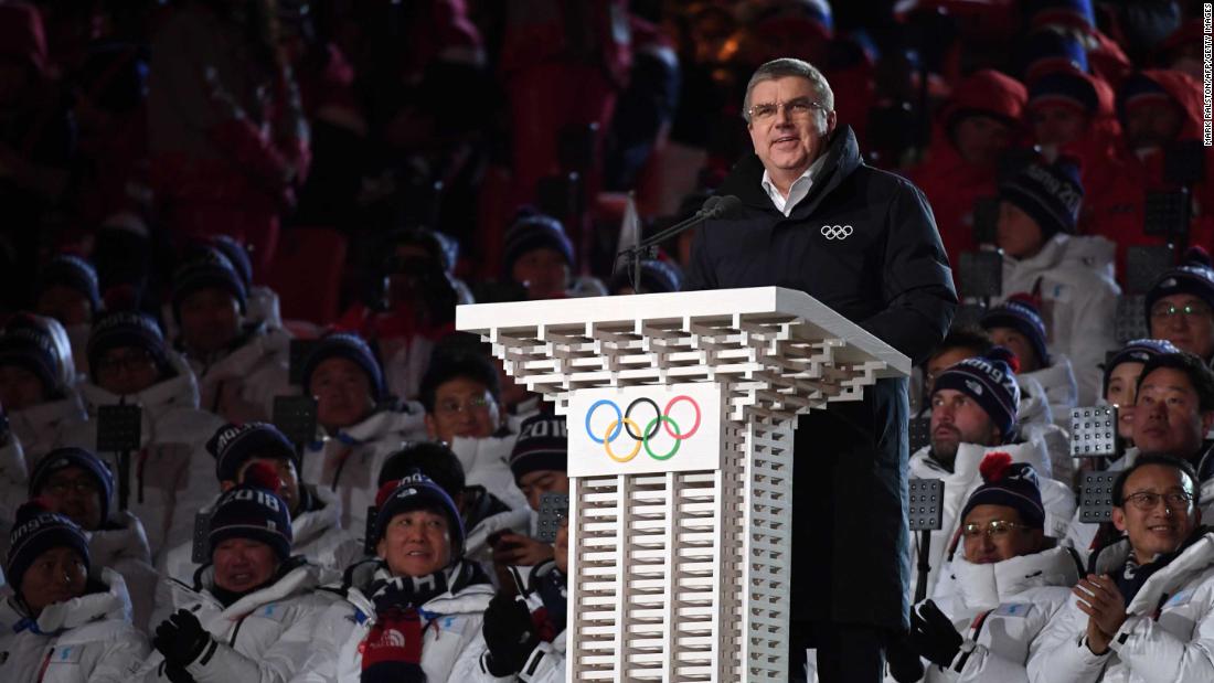 Thomas Bach, the president of the International Olympic Committee, speaks before the lighting of the cauldron.