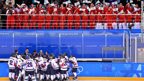 North Korean cheerleaders enthusiastically root for Korea during a match against Switzerland.