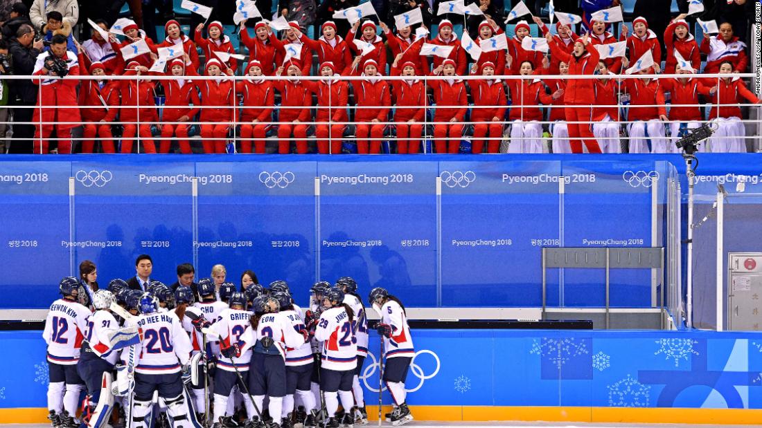 North Korean cheerleaders enthusiastically root for Korea during a match against Switzerland.