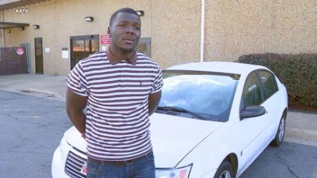 Trenton Lewis was gifted a 2006 Saturn Ion after his co-workers discovered he&#39;d been walking 11 miles to work each day.