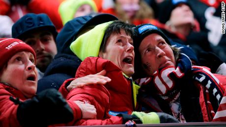 Sue Sweeney, center, the mother of Emily Sweeney of the United States, cries out as her daughter crashes on the final run during the women&#39;s luge final at the 2018 Winter Olympics in Pyeongchang, South Korea, Tuesday, Feb. 13, 2018. (AP Photo/Wong Maye-E)