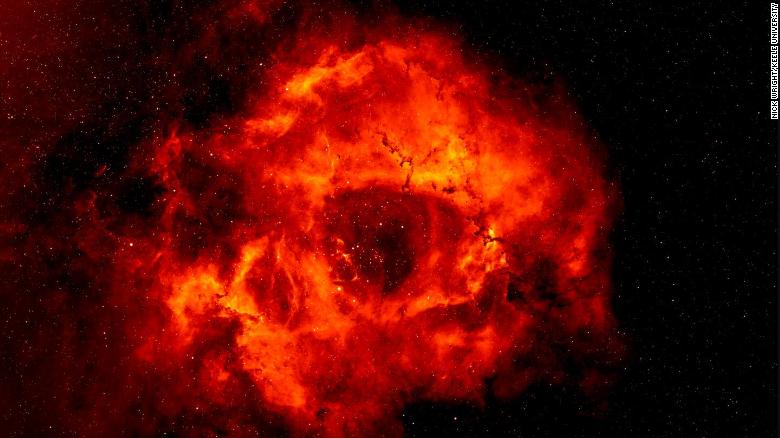 The Rosette Nebula is 5,000 light-years from Earth. The distinctive nebula, which some claim looks more like a skull, has a hole in the middle that creates the illusion of its rose-like shape. 