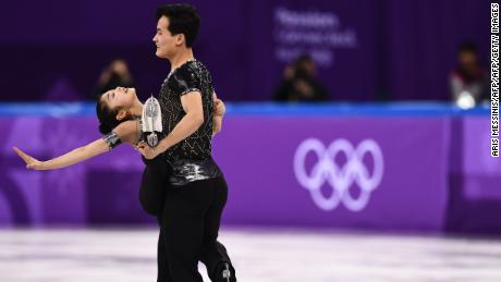 North Korea&#39;s Ryom Tae Ok (L) and North Korea&#39;s Kim Ju Sik competed in the pair skating short program event.
