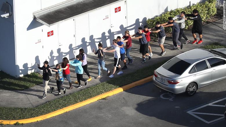 Students evacuate the school.