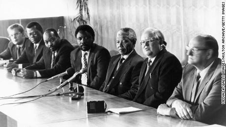 Former President Nelson Mandela with Cyril Ramaphosa and Jacob Zuma.