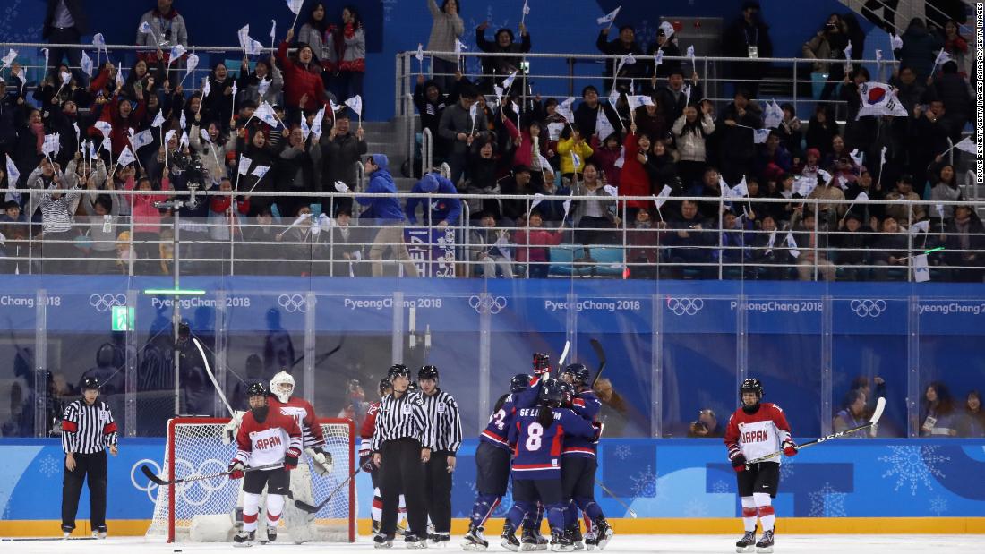 The unified Korean team celebrates Griffin's goal against Japan. 