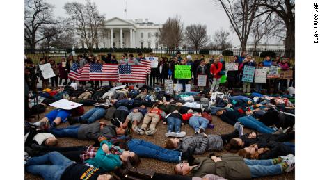 Demonstrators participate in a &quot;lie-in&quot; during a protest in favor of gun control reform in front of the White House, Monday, Feb. 19, 2018, in Washington. (AP Photo/Evan Vucci)