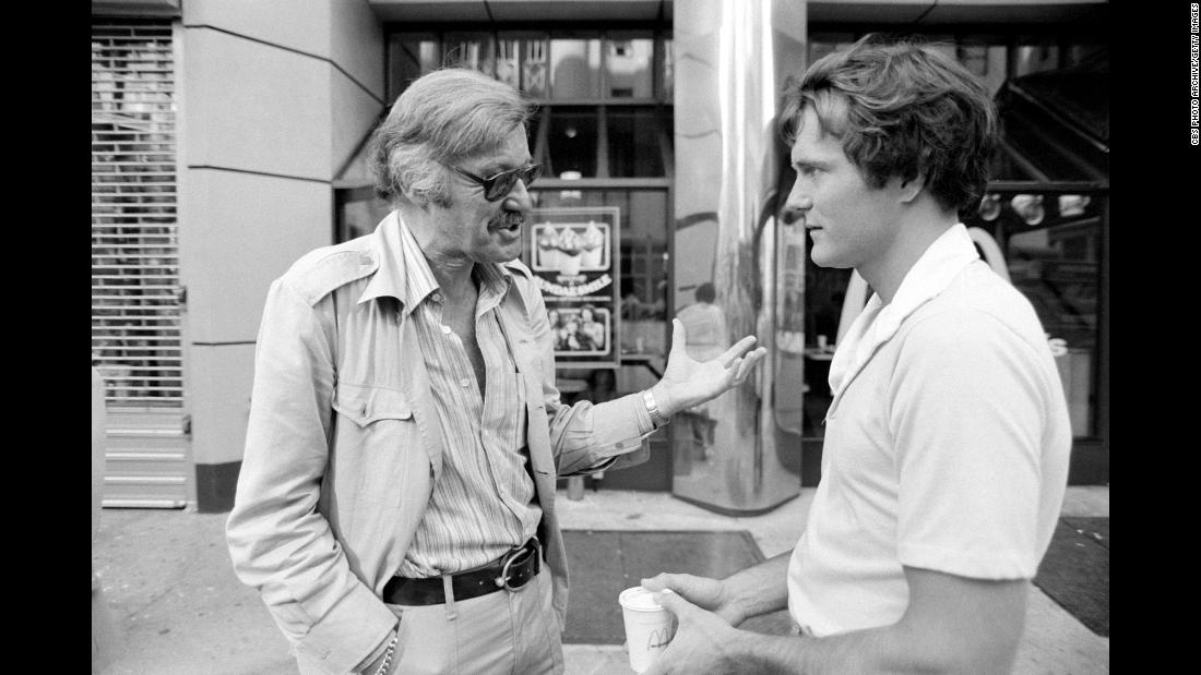 Lee talks to actor Nicholas Hammond during the filming of the television series &quot;The Amazing Spider-Man&quot; in 1978.