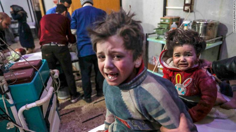 Injured children are treated at a hospital in rebel-held Douma, Eastern Ghouta, on Monday.