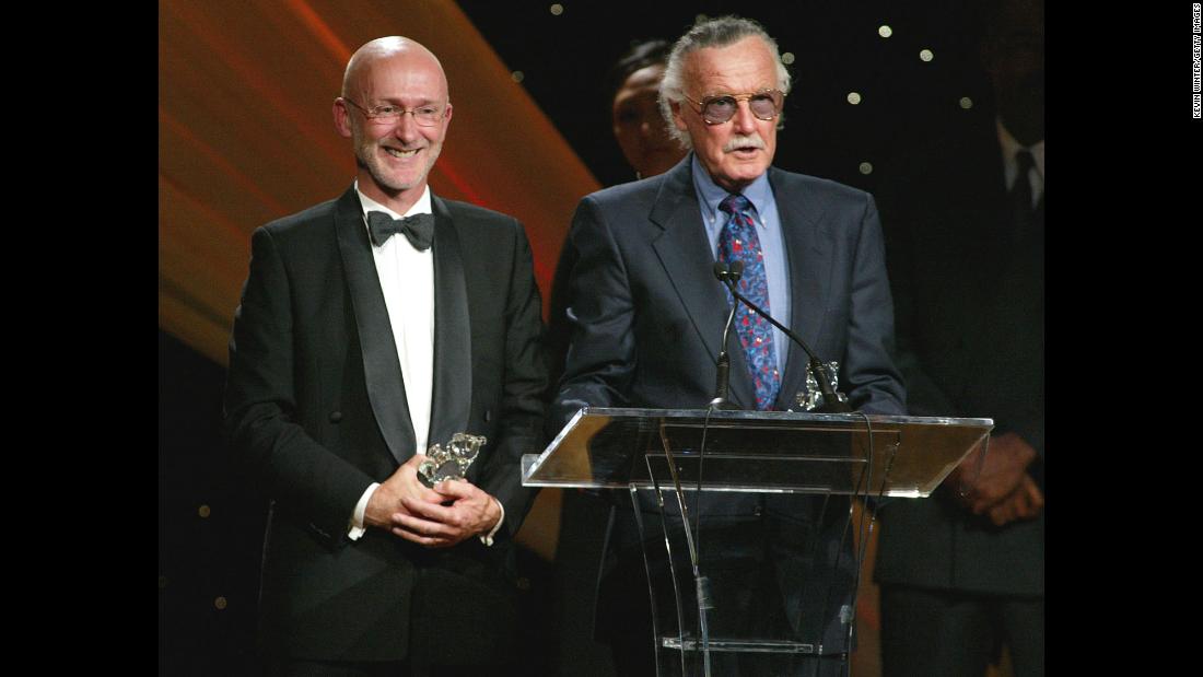 Lee and film producer Ian Bryce accept a Faith and Values Award for the &quot;Spider-Man&quot; film in 2003.