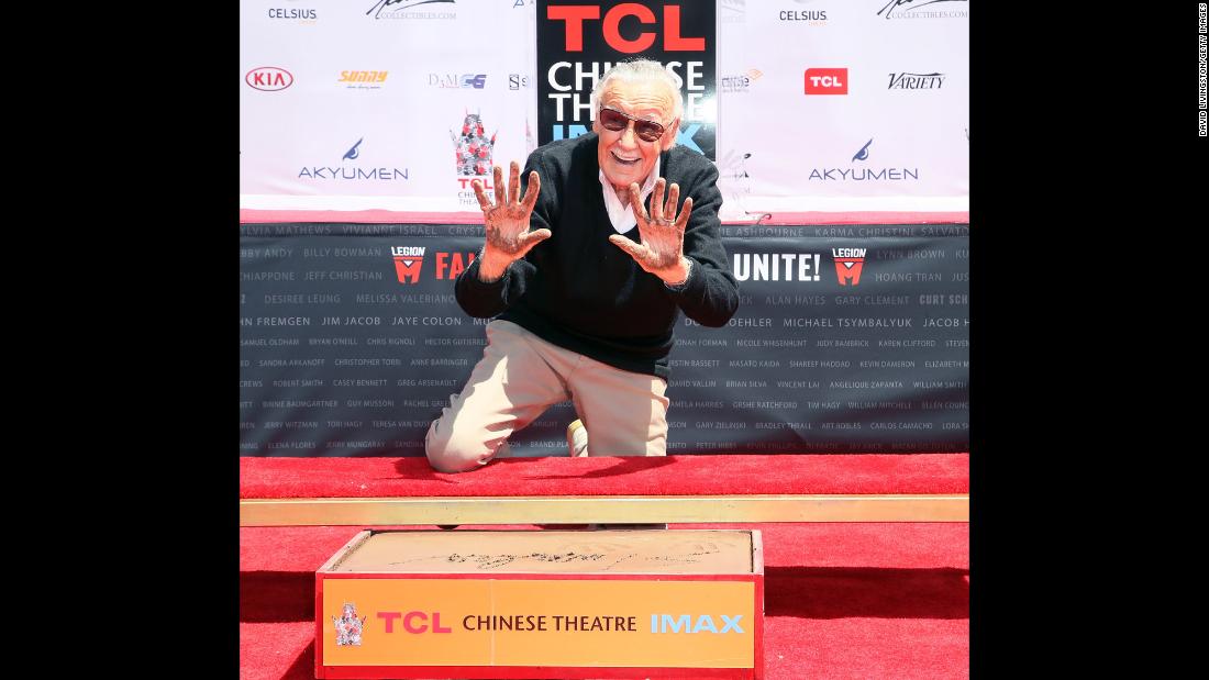 Lee leaves his handprints and footprints outside the TCL Chinese Theatre in Hollywood in July 2017.