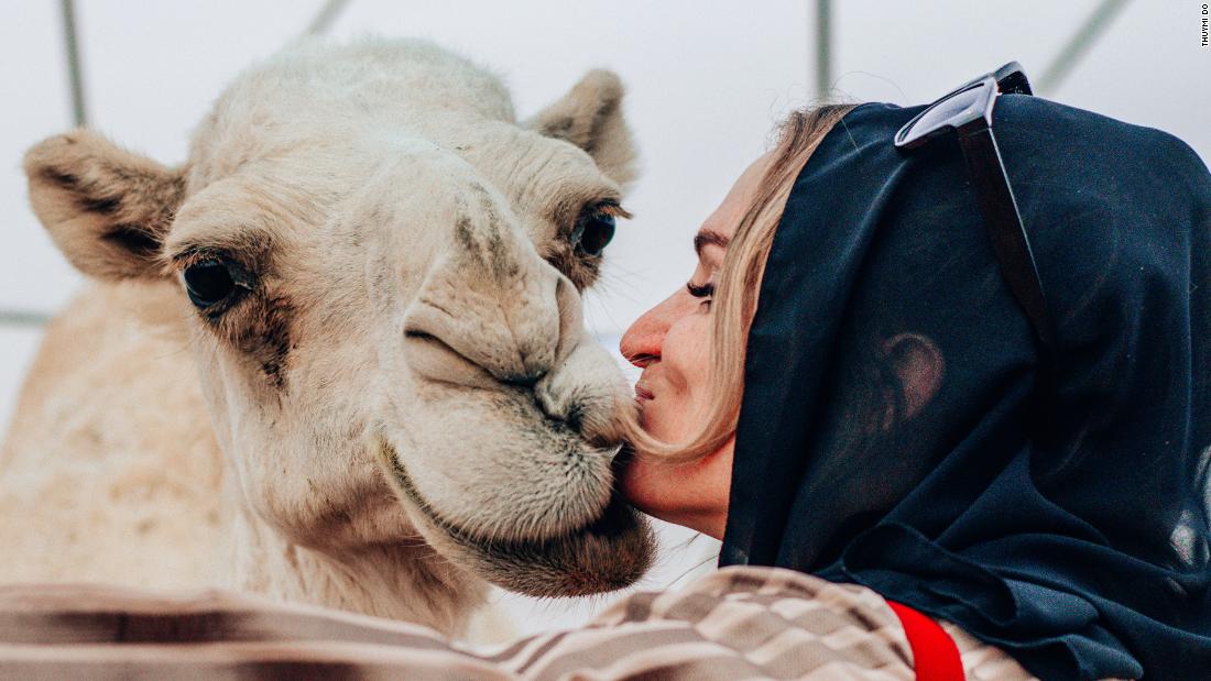 &lt;strong&gt;Star attraction: &lt;/strong&gt;Journalist Danae Mercer shares a kiss with one of the thousands of camels at the festival.