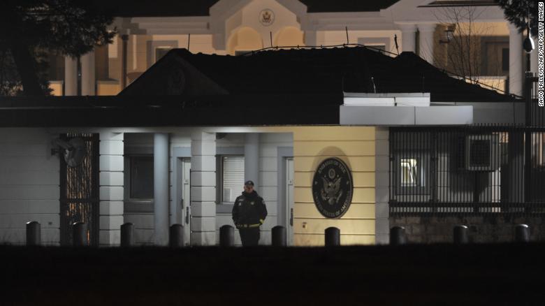 Police guard the entrance to the US Embassy compound in Podgorica after Thursday&#39;s explosion.