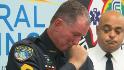Officer brought to tears recounting school shooting
