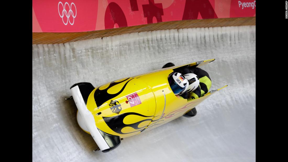Francesco Friedrich pilots a four-man bobsled for Germany. Friedrich&#39;s team leads halfway through the competition.