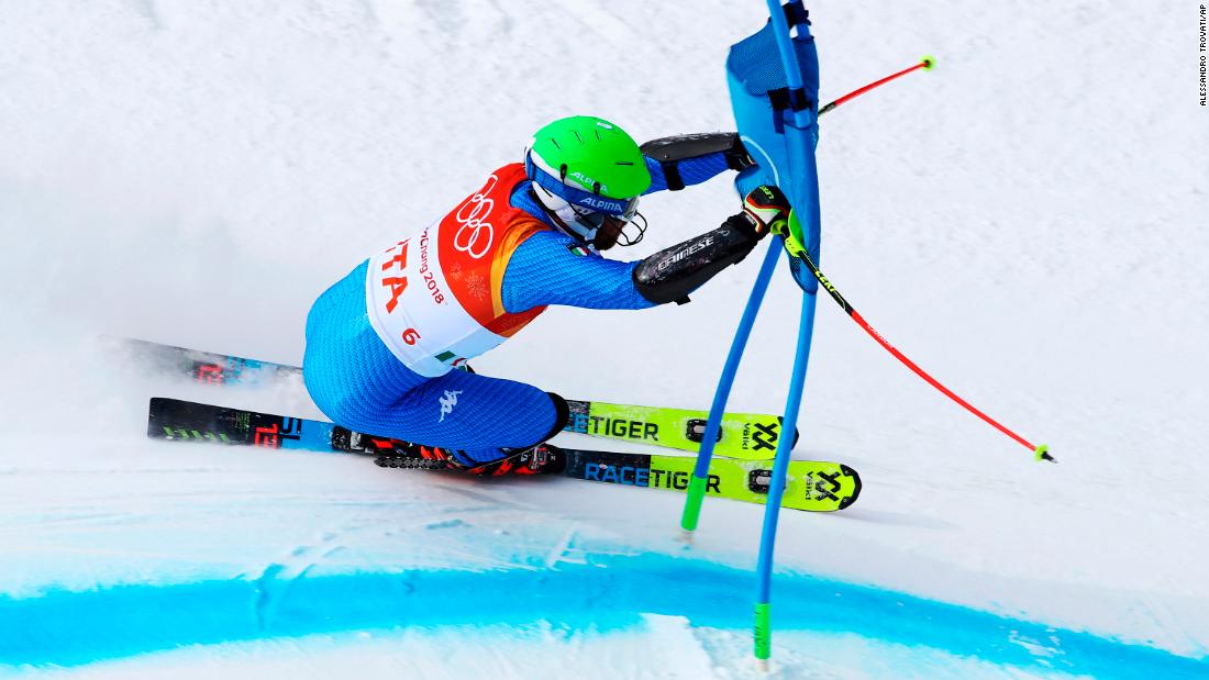 Italy&#39;s Riccardo Tonetti skis during the team event.