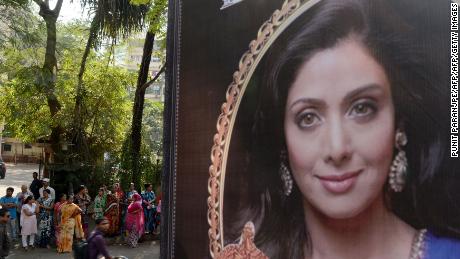 A picture of Sridevi is seen placed outside her residence in Mumbai on February 26, 2018, following her death.  