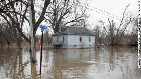 Floodwaters surround a home on February 22 in Lake Station, Indiana.