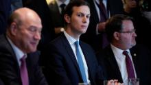 From left: Director of the National Economic Council Gary Cohn, Senior Advisor Jared Kushner, and Sentor Gary Peters, D-MI, take part in a meeting with US President Donald Trump and members of Congress on trade in the Cabinet Room of the White House on February 13, 2018 in Washington, DC. (MANDEL NGAN/AFP/Getty Images)