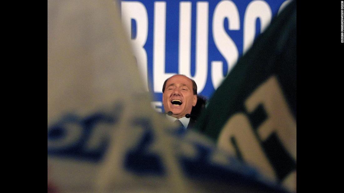 Berlusconi smiles during a rally in Rome on May 11, 2001. Two days later, he won the general election.