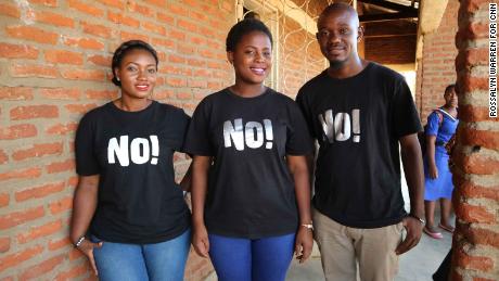 Instructors Simang&#39;aliso Domoya, left, Patricia Mvula, center, and Dominc Luo, right, outside the Lilongwe classroom.