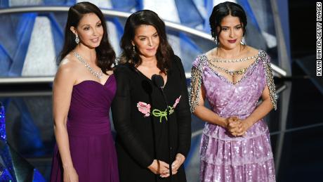 Ashley Judd, Annabella Sciorra and Salma Hayek speak onstage during the 90th Annual Academy Awards.