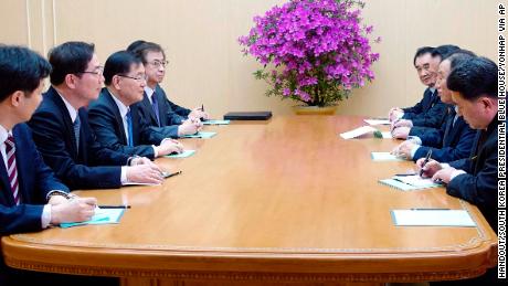 In this photo provided by South Korea Presidential Blue House Monday, South Korean national security director, Chung Eui-yong, third from left, meets with North Korean vice chairman of North Korea's ruling Workers' Party Central Committee, Kim Yong Chol, second from right, in Pyongyang, North Korea.