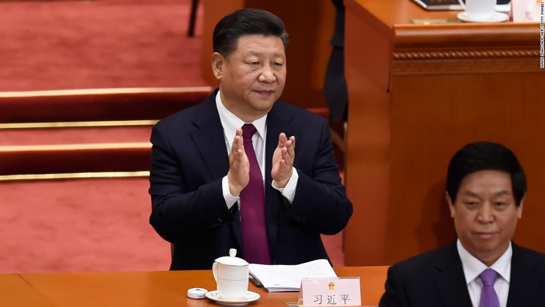 Chinese President Xi Jinping applauds during the opening session of the National People&#39;s Congress, China&#39;s legislature, at the Great Hall of the People in Beijing on March 5, 2018. / AFP PHOTO / WANG ZHAO (Photo credit should read WANG ZHAO/AFP/Getty Images)
