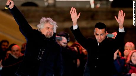 M5S leader Luigi Di Maio (R) and party founder Beppe Grillo (L) attend the party&#39;s final rally last Friday.  