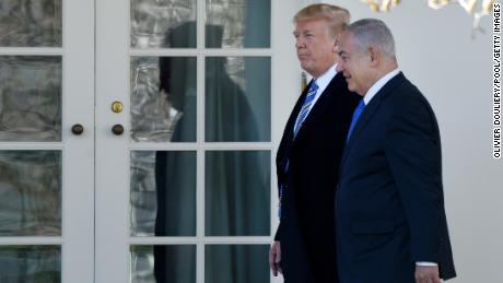Trump greets embattled Netanyahu, signs Golan Heights proclamation