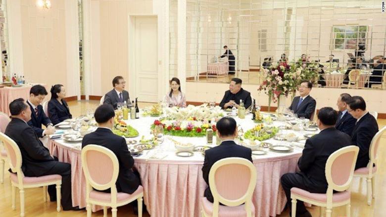 North Korean leader Kim Jong Un (center right) sits with a visiting South Korean delegation in Pyongyang and other high-level North Koreans. 