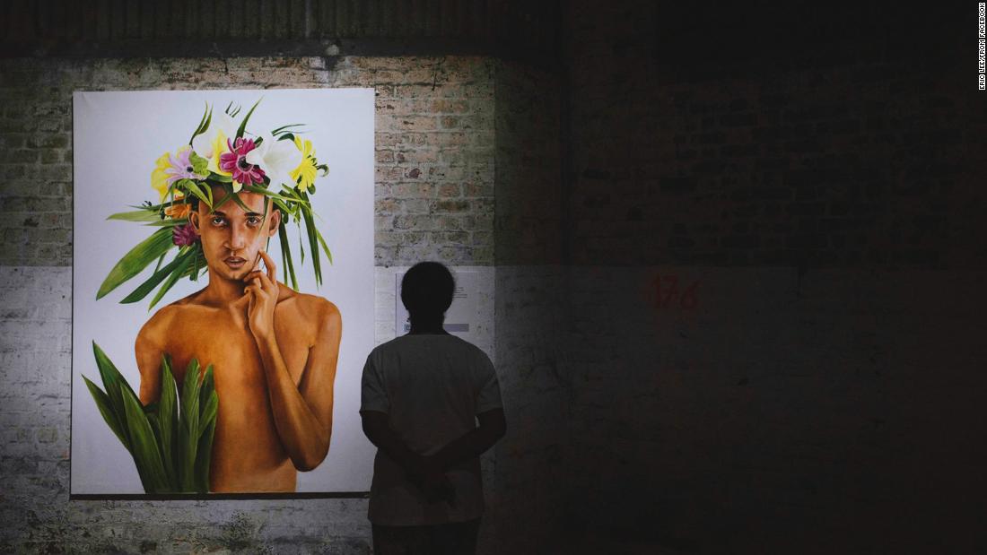 This portrait is by Mauritian artist, Thierry Amery. The crown of flowers ties in with the festival&#39;s theme, representing man&#39;s relationship with nature. 