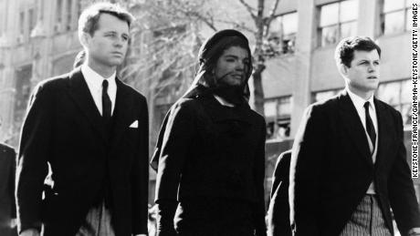 Robert F. Kennedy, left, Jacqueline Kennedy, and Ted Kennedy attend President John F. Kennedy&#39;s funeral in 1963.