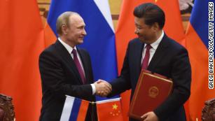 Putin to visit China as leaders consolidate power at home