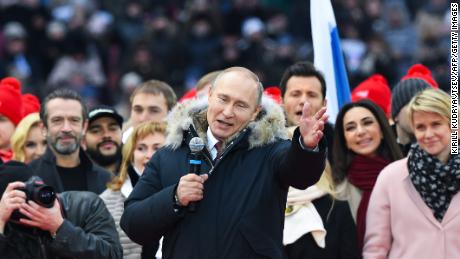 TOPSHOT - Presidential candidate, President Vladimir Putin gives a speech during a rally to support his candidature in the upcoming presidential election at the Luzhniki stadium in Moscow on March 3, 2018.
Russians will go to the polls on March 18, 2018. / AFP PHOTO / Kirill KUDRYAVTSEV        (Photo credit should read KIRILL KUDRYAVTSEV/AFP/Getty Images)