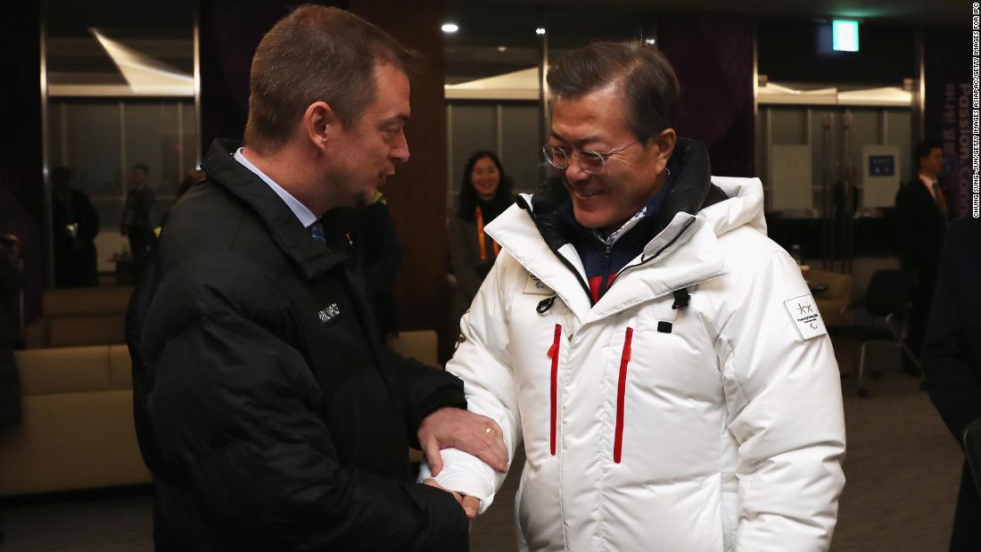 South Korean President Moon Jae-in meets with International Paralympic Committee President Andrew Parsons at the opening ceremony.