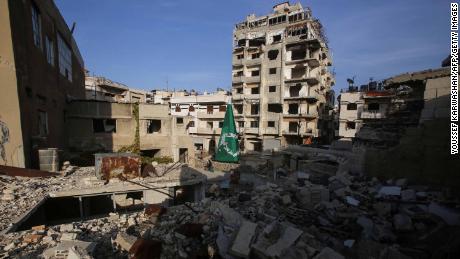 A Christmas tree stands amongst the rubble in the Christian-majority neighbourhood of Hamidiyeh, in the old city of Homs, on December 17, 2017.
