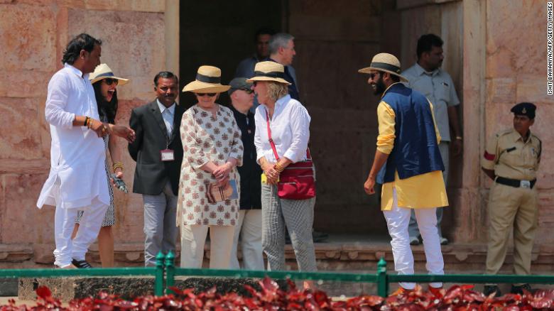 Former US politician Hillary Clinton (C) tours the Jahaj Mahal part of an abandoned royal palace complex, while on a personal trip to the ancient city of Mandu in India's Madhya Pradesh state on March 12, 2018. 
