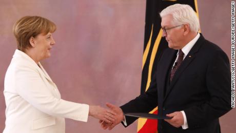 Chancellor Angela Merkel with German President Frank-Walter Steinmeier Wednesday