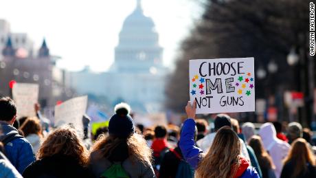 After a rally in front of the White House, students march up Pennsylvania Avenue toward Capitol Hill on  March 14.