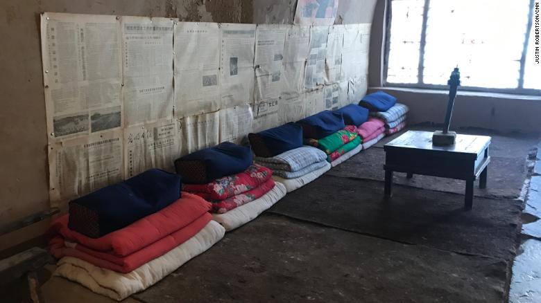 Xi&#39;s bed (shared with five others with his spot being the second from left) in his &quot;cave house.&quot;