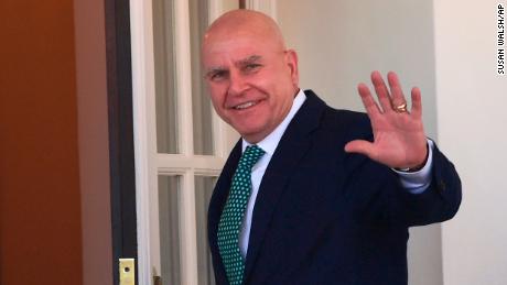 National security adviser H.R. McMaster waves as he walks into the West Wing of the White House in Washington, Friday, March 16, 2018.